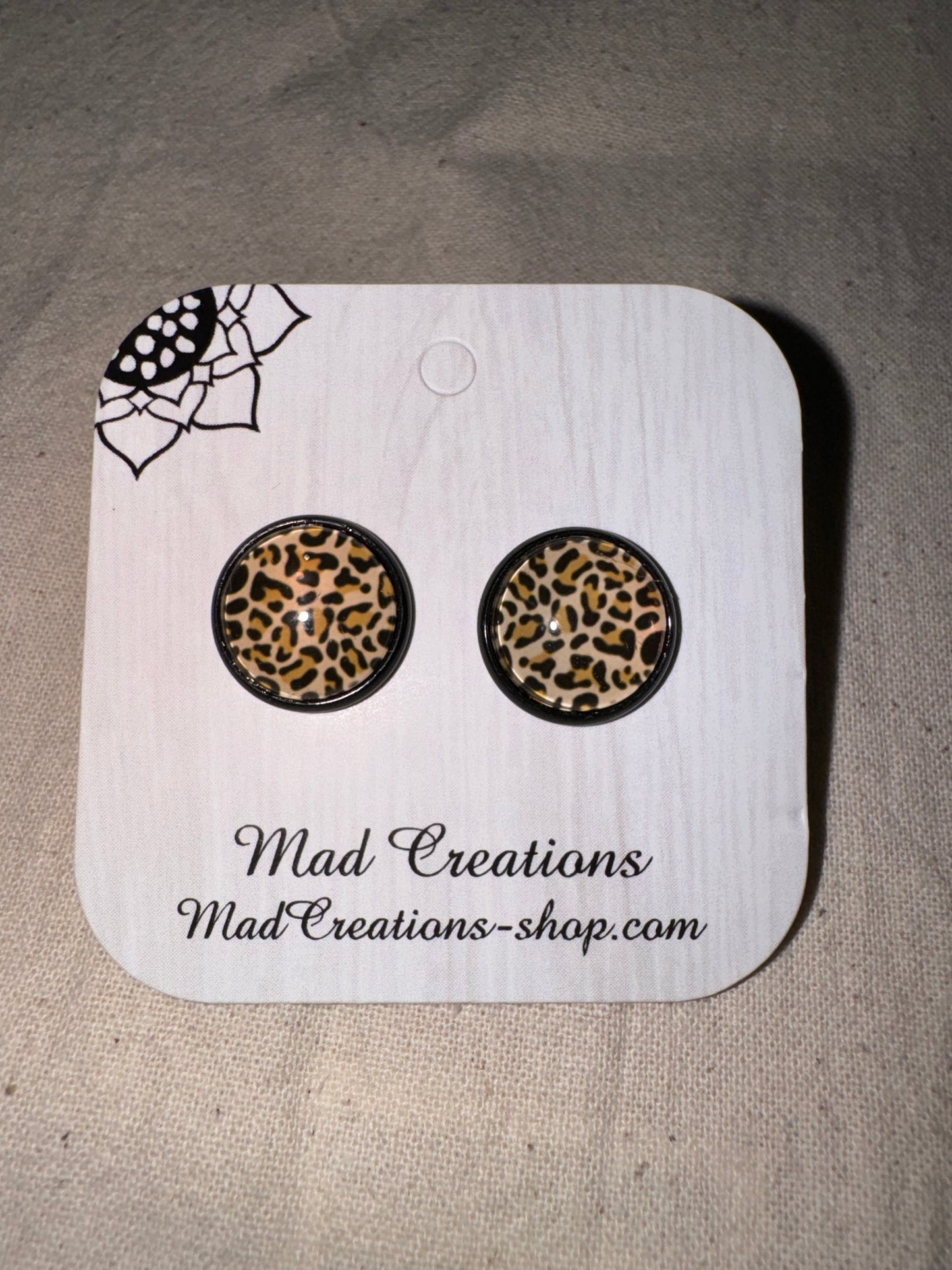 Leopard on black studs